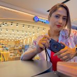GreenStory Woman Taking Photos at Shopping Mall