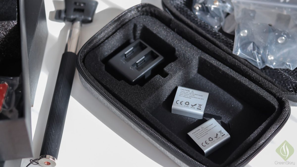 LUMOS action camera accessories in carrying case with batteries and mounts.